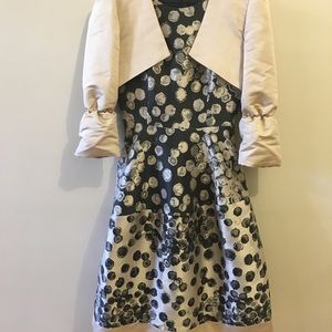 Magnificent women’s Carolina Herrera jumper with custom matching short blazer.